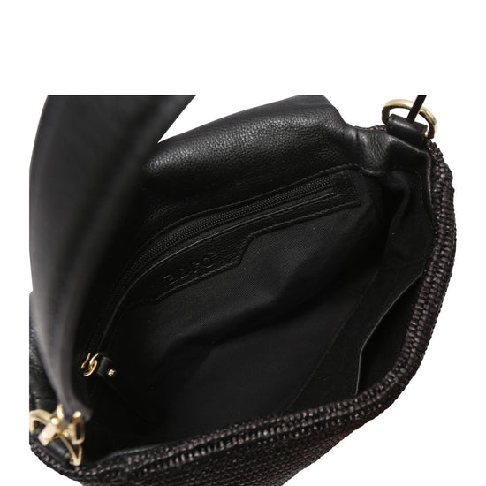 Interior shot raffia and leather handbag with gold toned hardwear from Abro