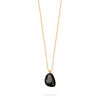 black onyx stone necklace with cz detail on the stone and delicate long gold chain close up