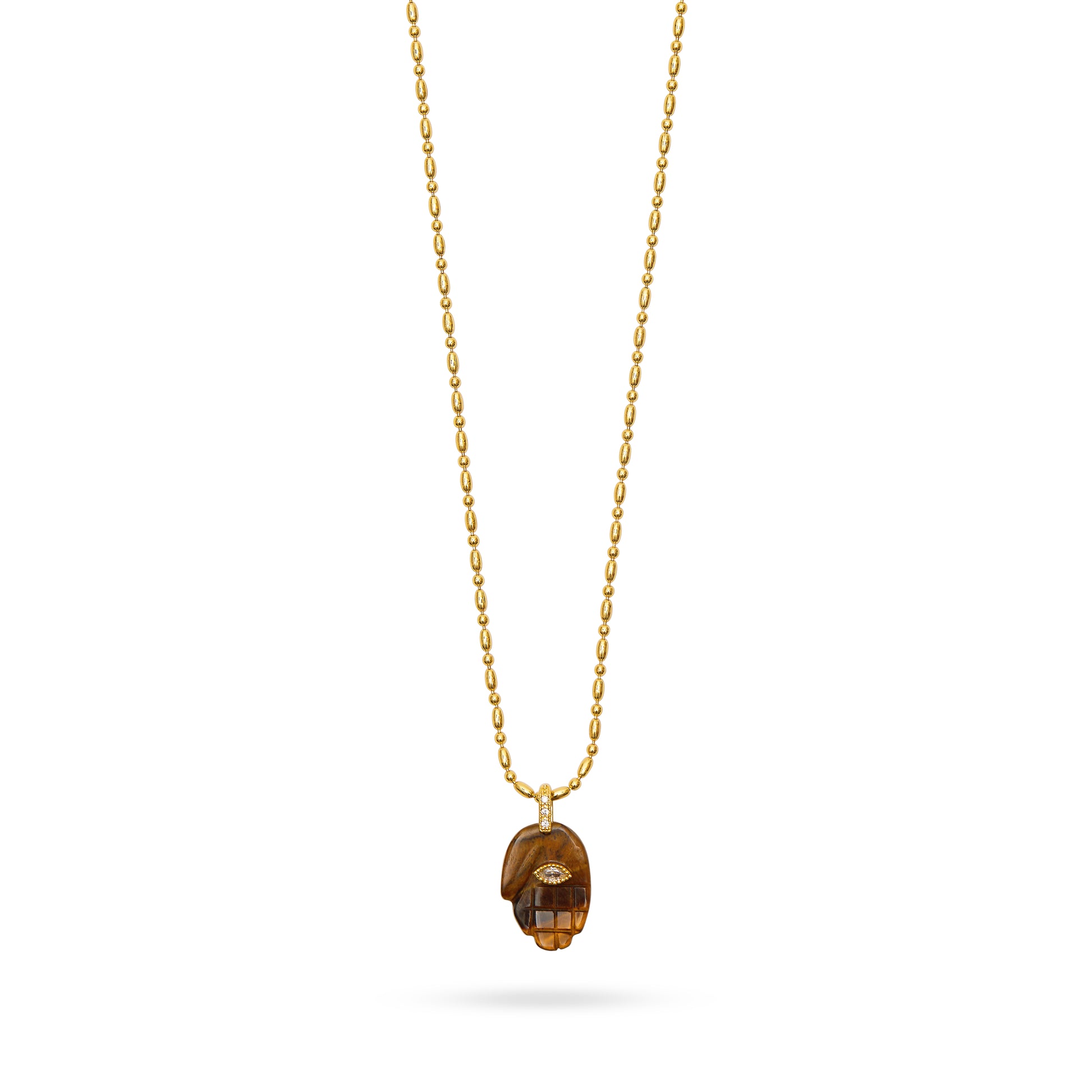 tigers eye hand pendant with evil eye and gold bamboo chain close up