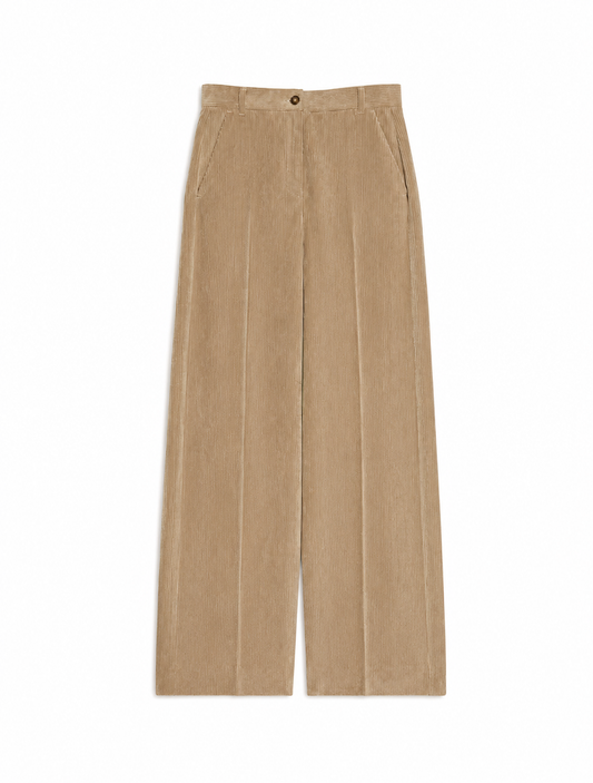 Brown trousers hanging on a wooden rod against a white background