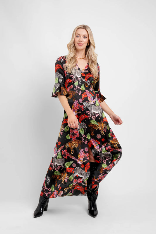 v neck silk dress with elbow length fluted sleeves and front split with covered buttons down the front