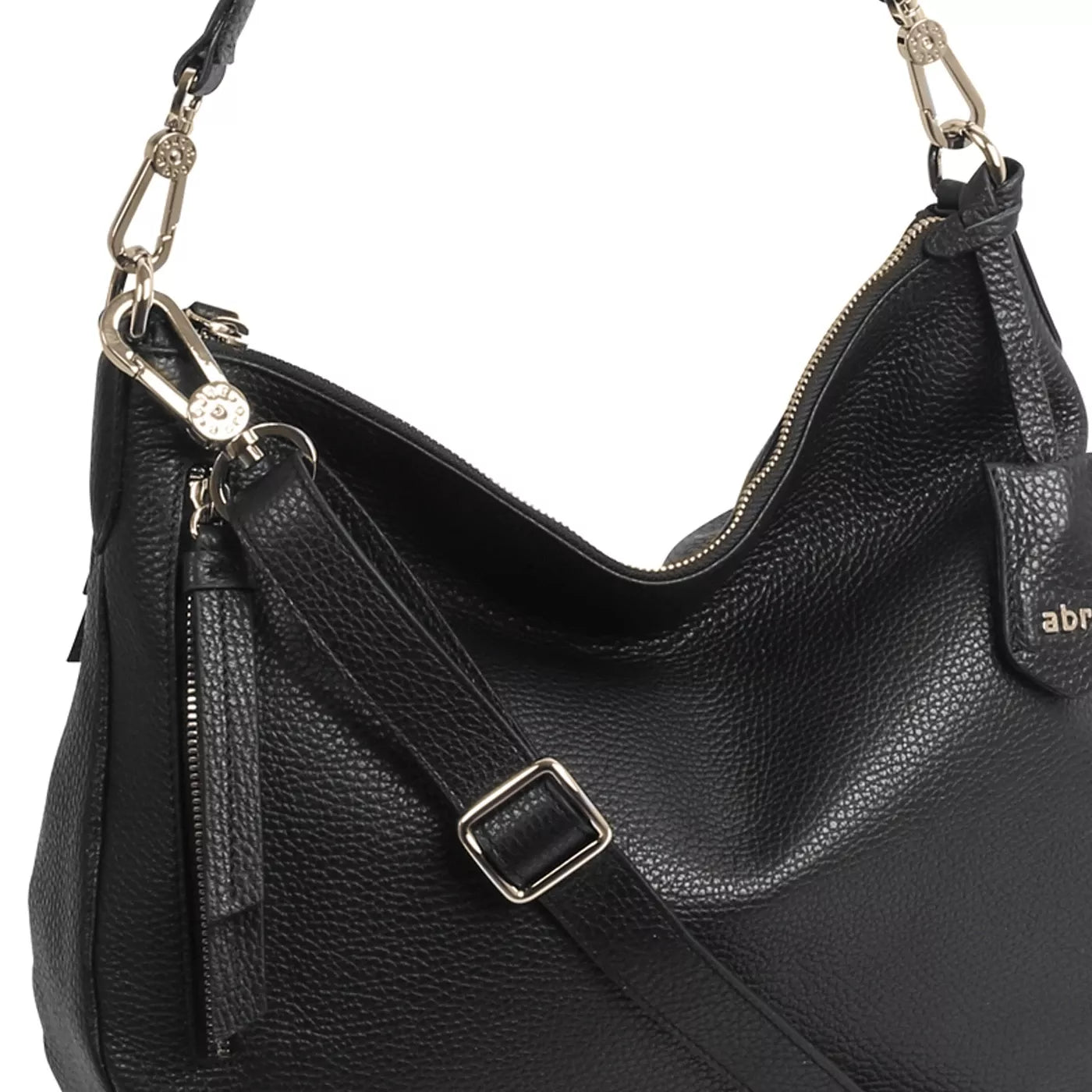 black curved moonshape leather bag with top handle close up