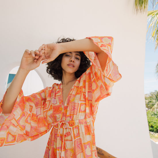 Kimono style beach print dress with a V neck and drawstring waist Kimono style beach print dress with a V neck and drawstring waist