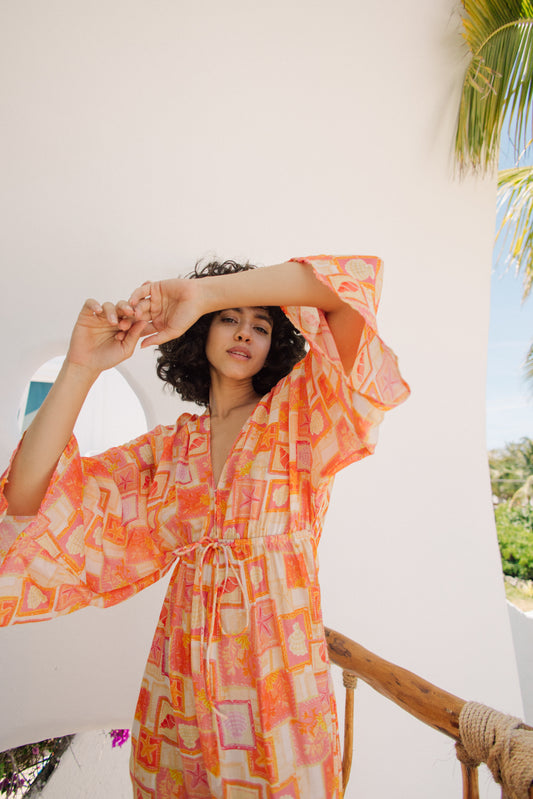 Kimono style beach print dress with a V neck and drawstring waist Kimono style beach print dress with a V neck and drawstring waist