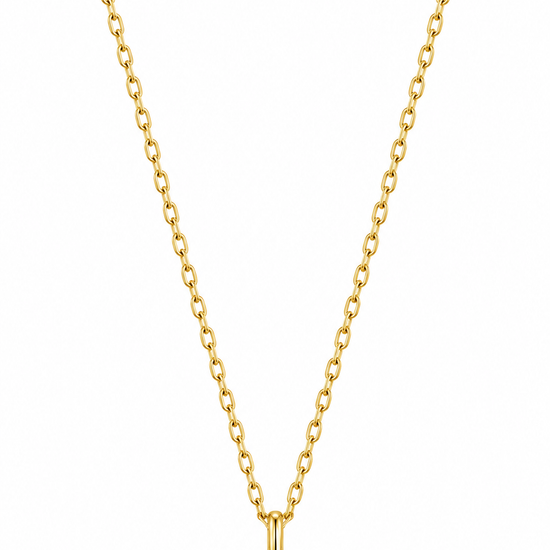 A gold chain necklace with a T-bar pendant featuring a small central clear gemstone, shown on a clean white background.