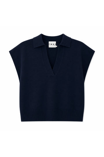 A navy blue knit polo vest with cap sleeves and a V-neckline, shown flat against a plain white background.