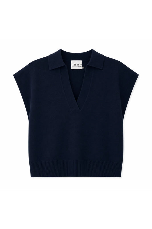 A navy blue knit polo vest with cap sleeves and a V-neckline, shown flat against a plain white background.