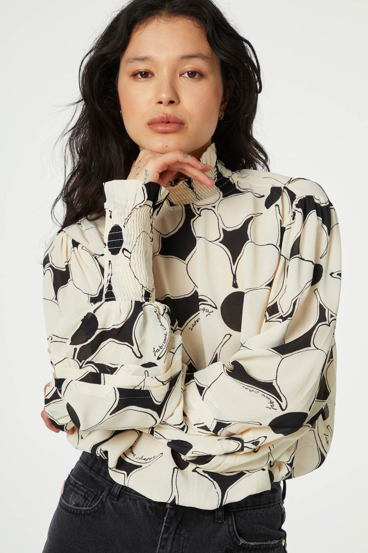 Pull on monochrome top with floral print and high neck with long sleeves