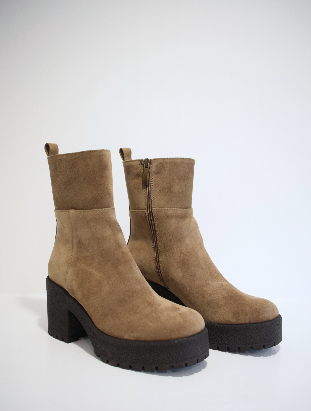 Taupe brown suede ankle boot with crepe black moulded rubber platform sole and heel