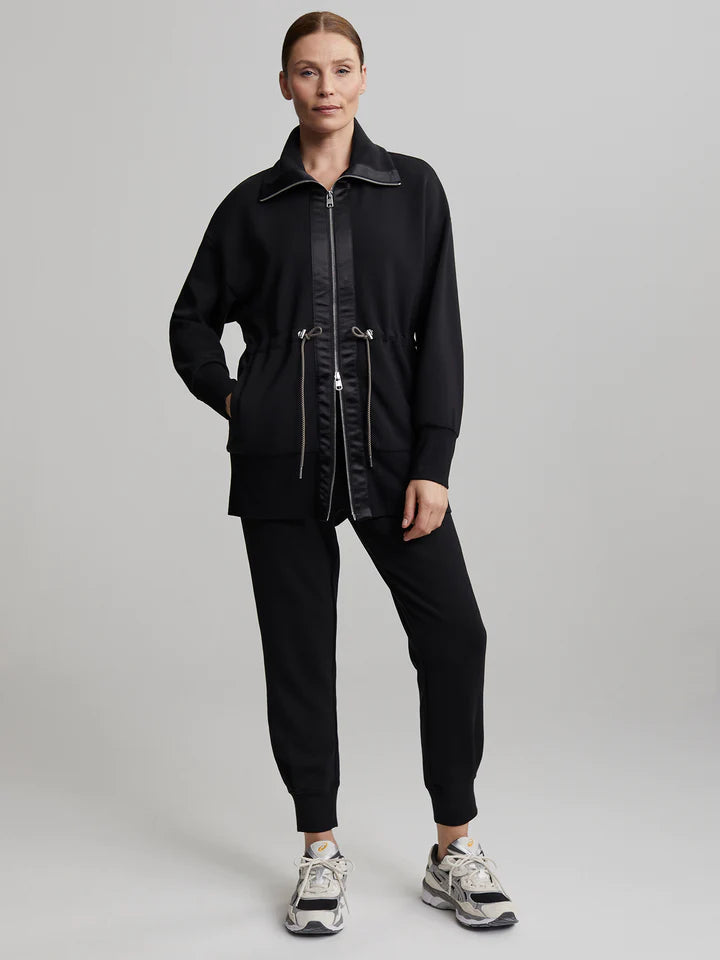 Black DoubleSoft™️ leisurewear top with full length placket and zip fastening with rope sewn in tie fastening with silver toggles and satin trim along the placket