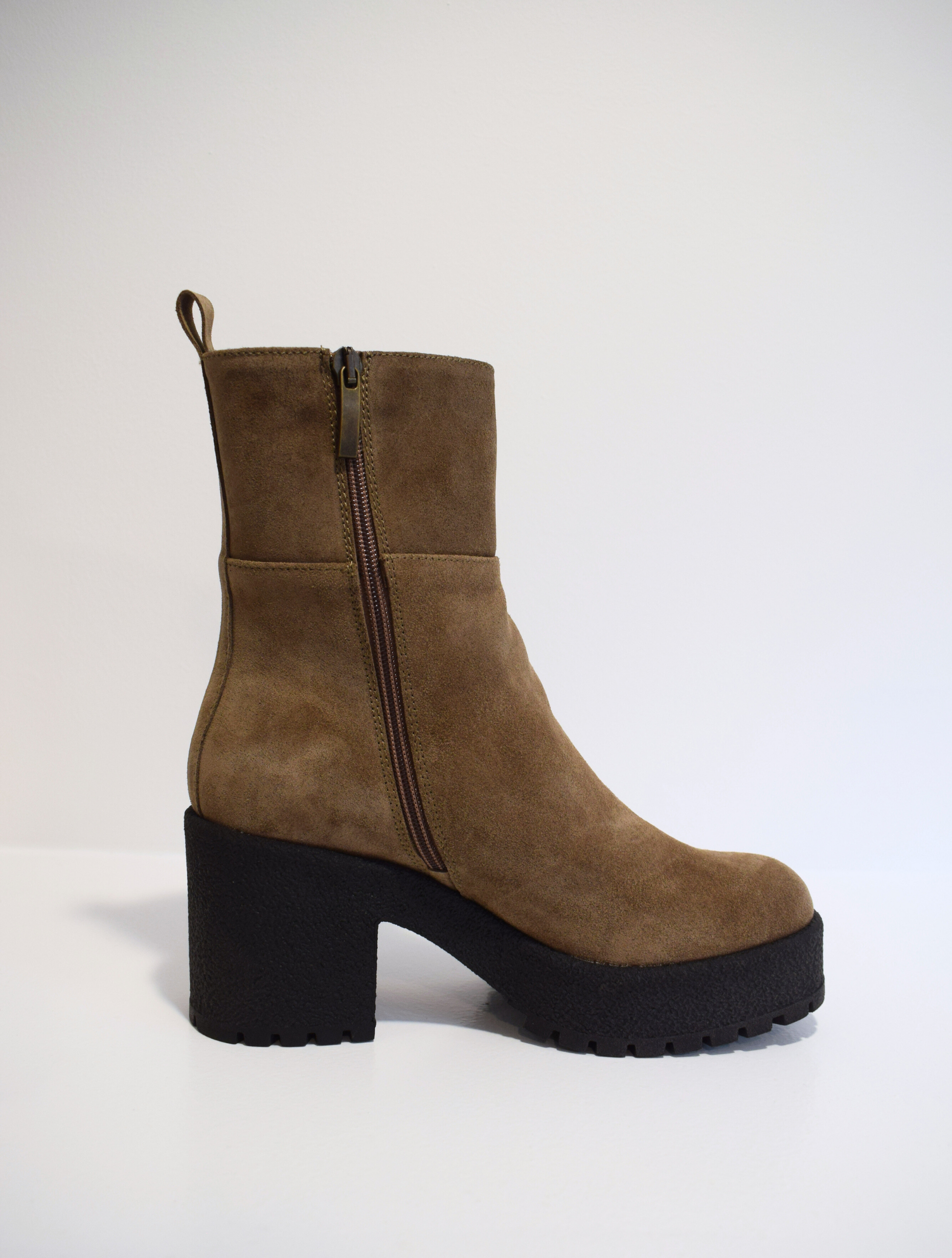 Taupe brown suede ankle boot with crepe black moulded rubber platform sole and heel