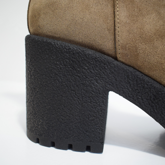 Taupe brown suede ankle boot with crepe black moulded rubber platform sole and heel