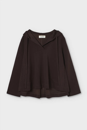 Brown blouse with a hood on a light gray background