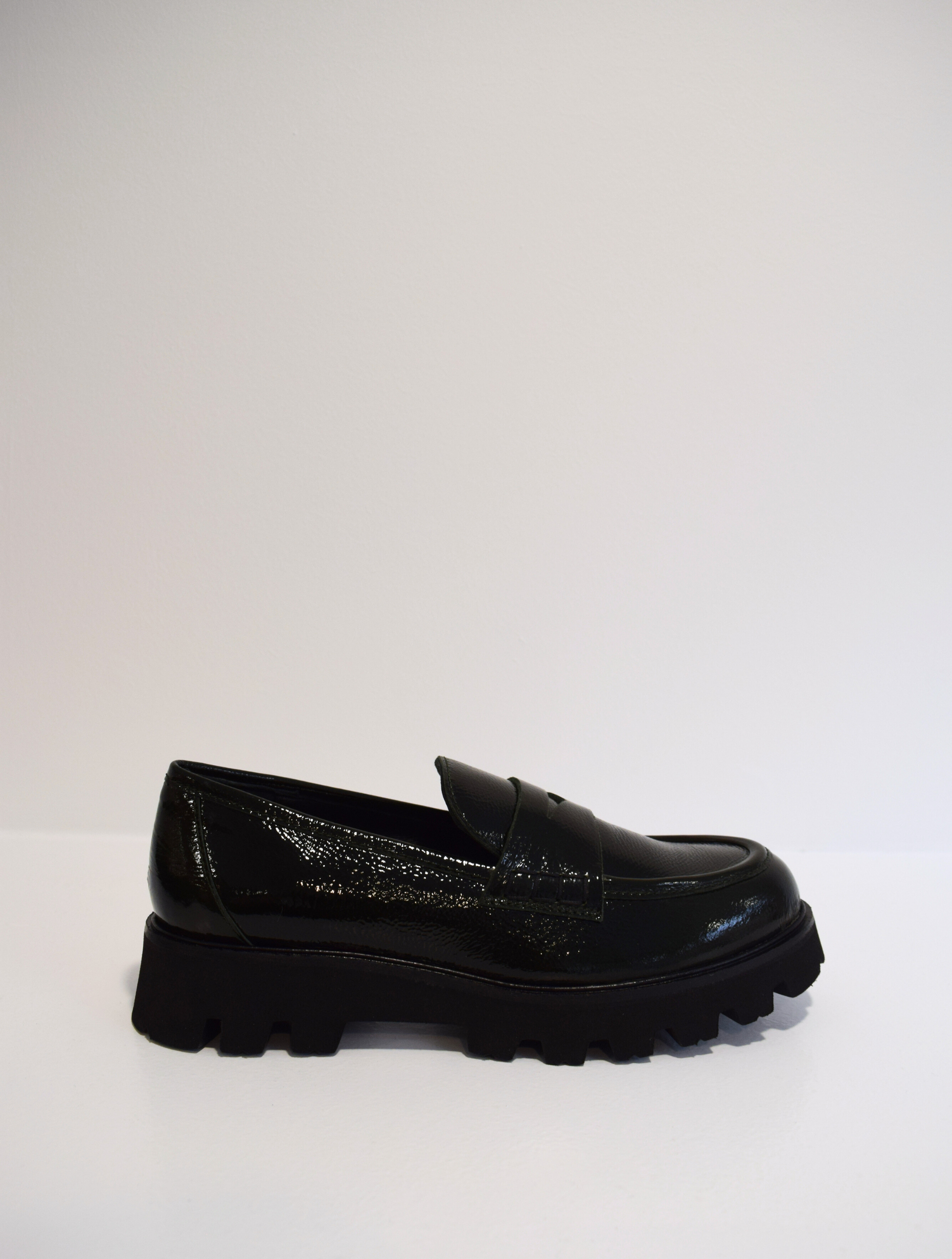 Patent moss green penny loafers with chunky black sole