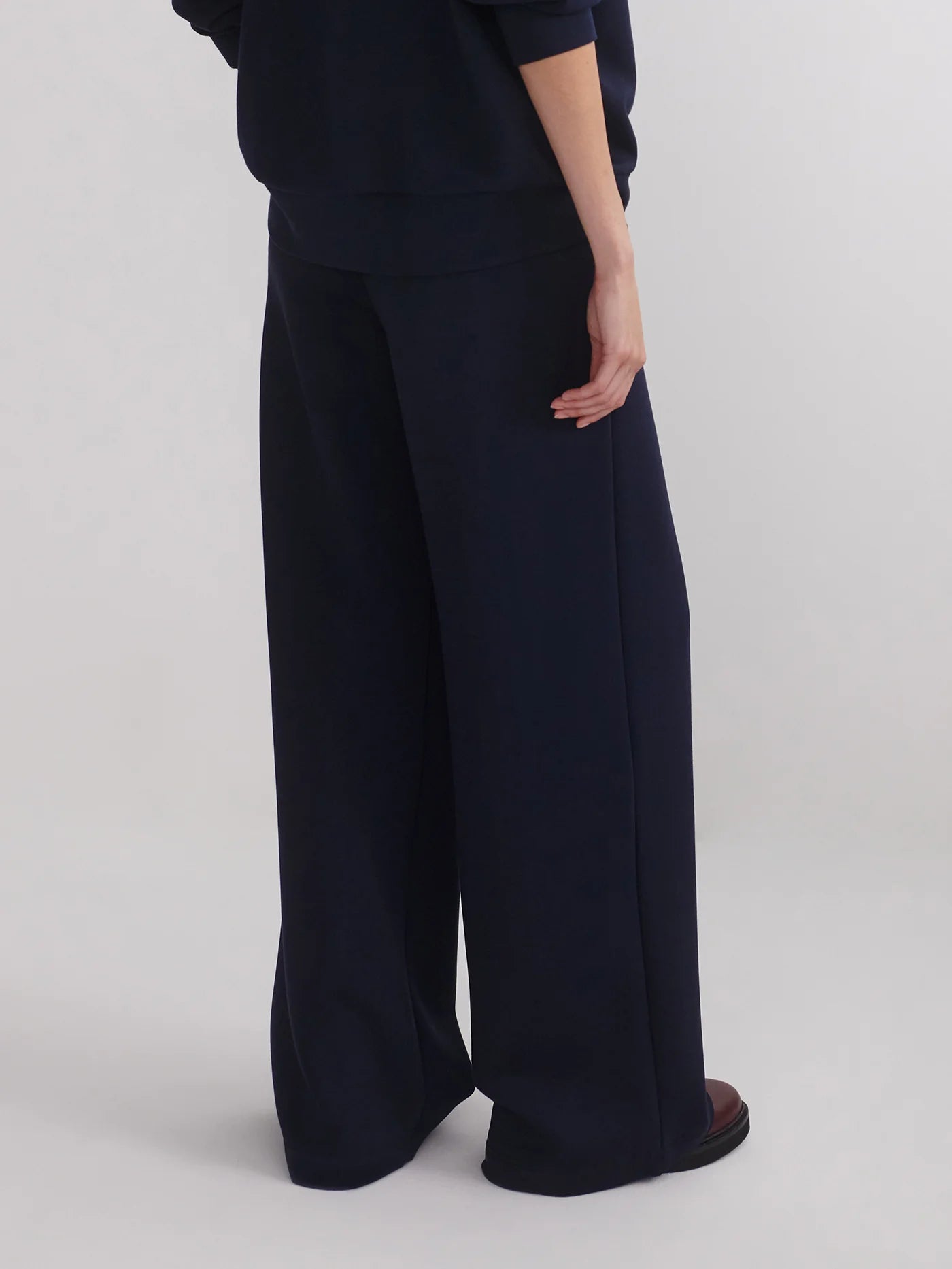 extra wide leg navy elasticated waistband trousers from varley rear view