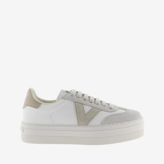 white platform trainers with beige suede v on side 
