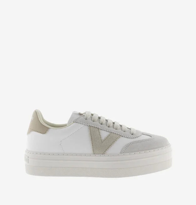 white platform trainers with beige suede v on side 