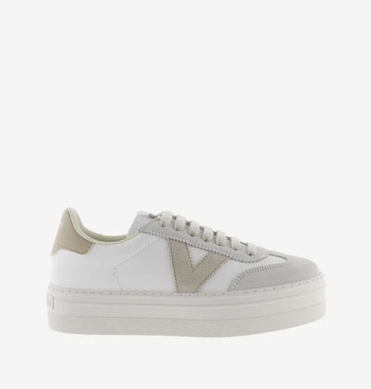 white platform trainers with beige suede v on side 