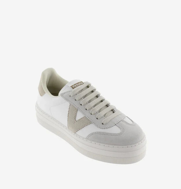 white platform trainers with beige suede v on side  