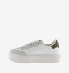 white platform trainers with green suede v on side from victoria side