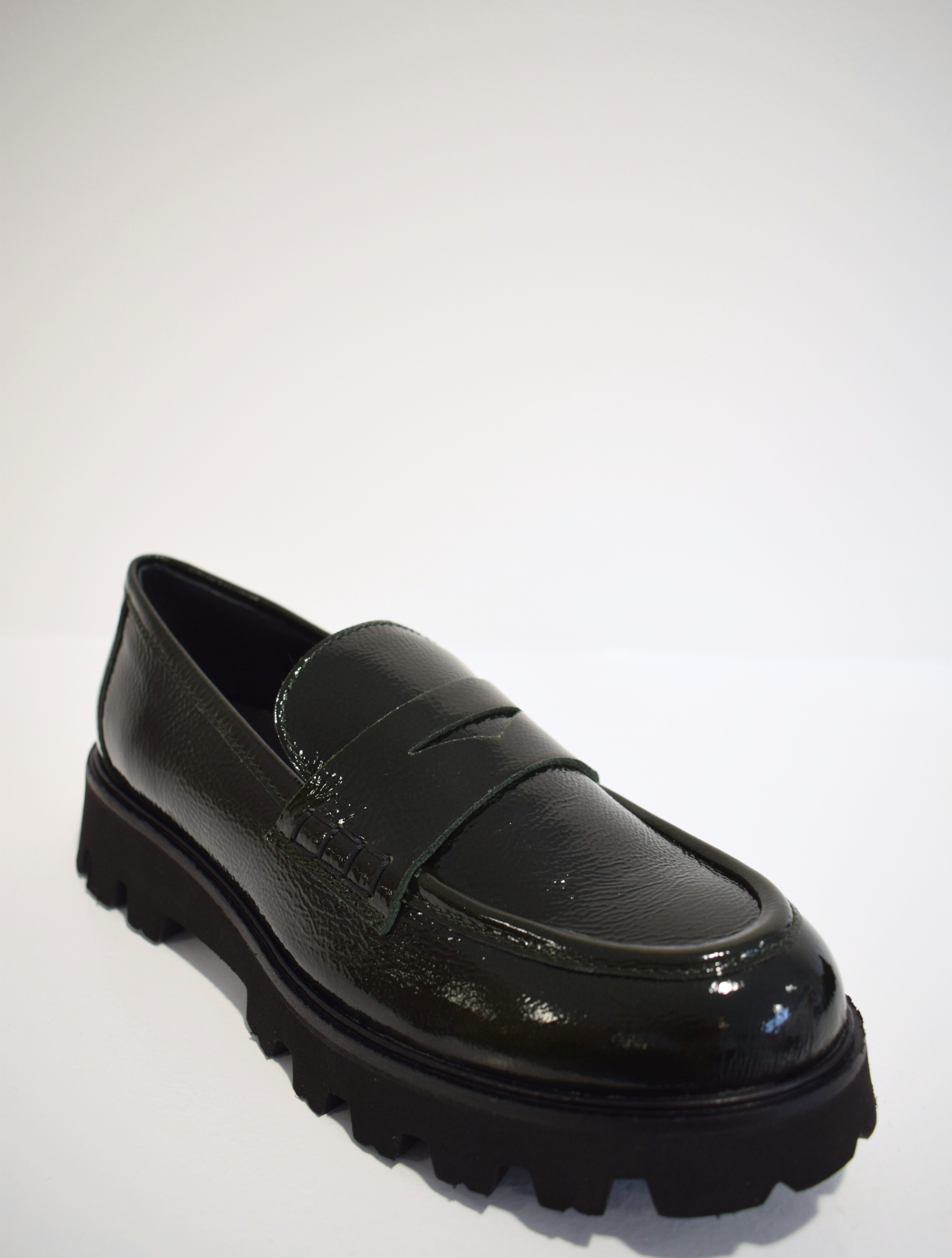 Patent moss green penny loafers with chunky black sole