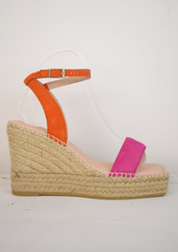 Raffia wedge sandle with pink toe strap and orange ankle strap. 