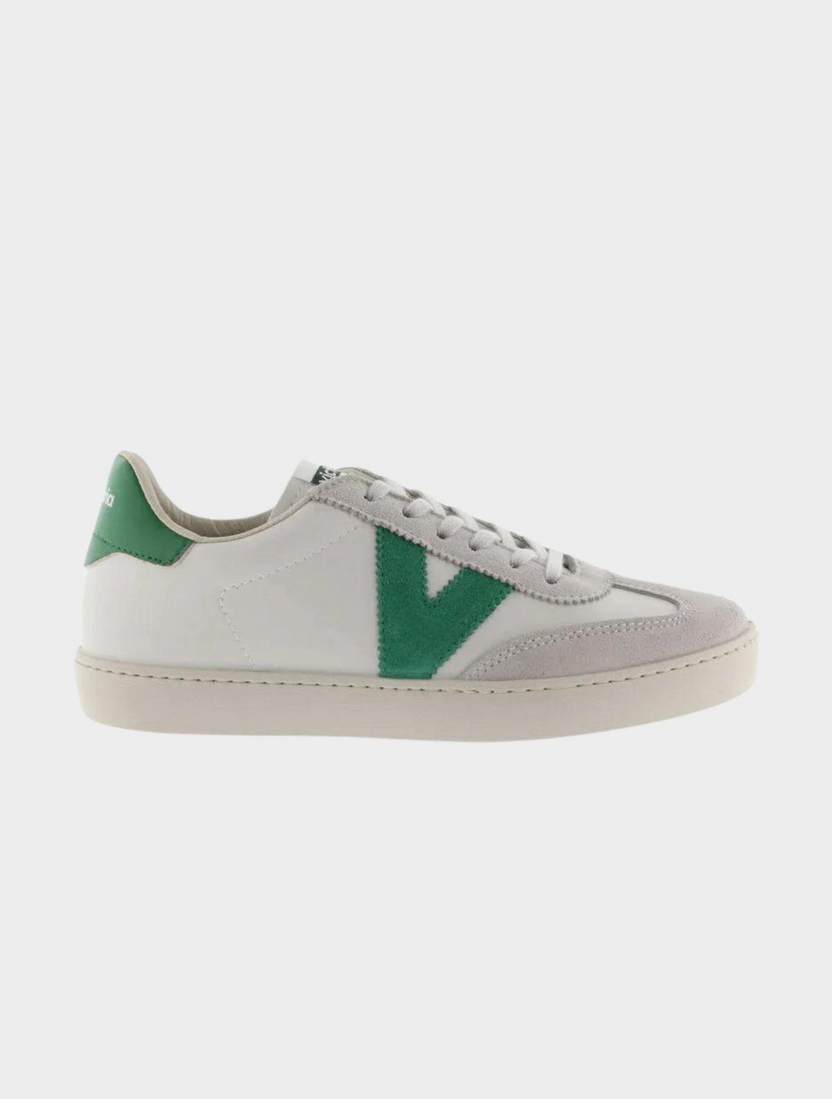 White leather pumps with suede toe flat rubber sole and contrast green "V" on the outer side and heel tab