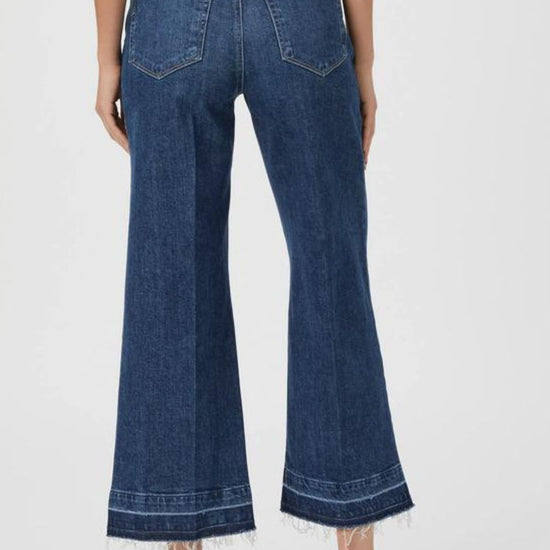 Rear view of Anessa cropped jeans with distressed hem