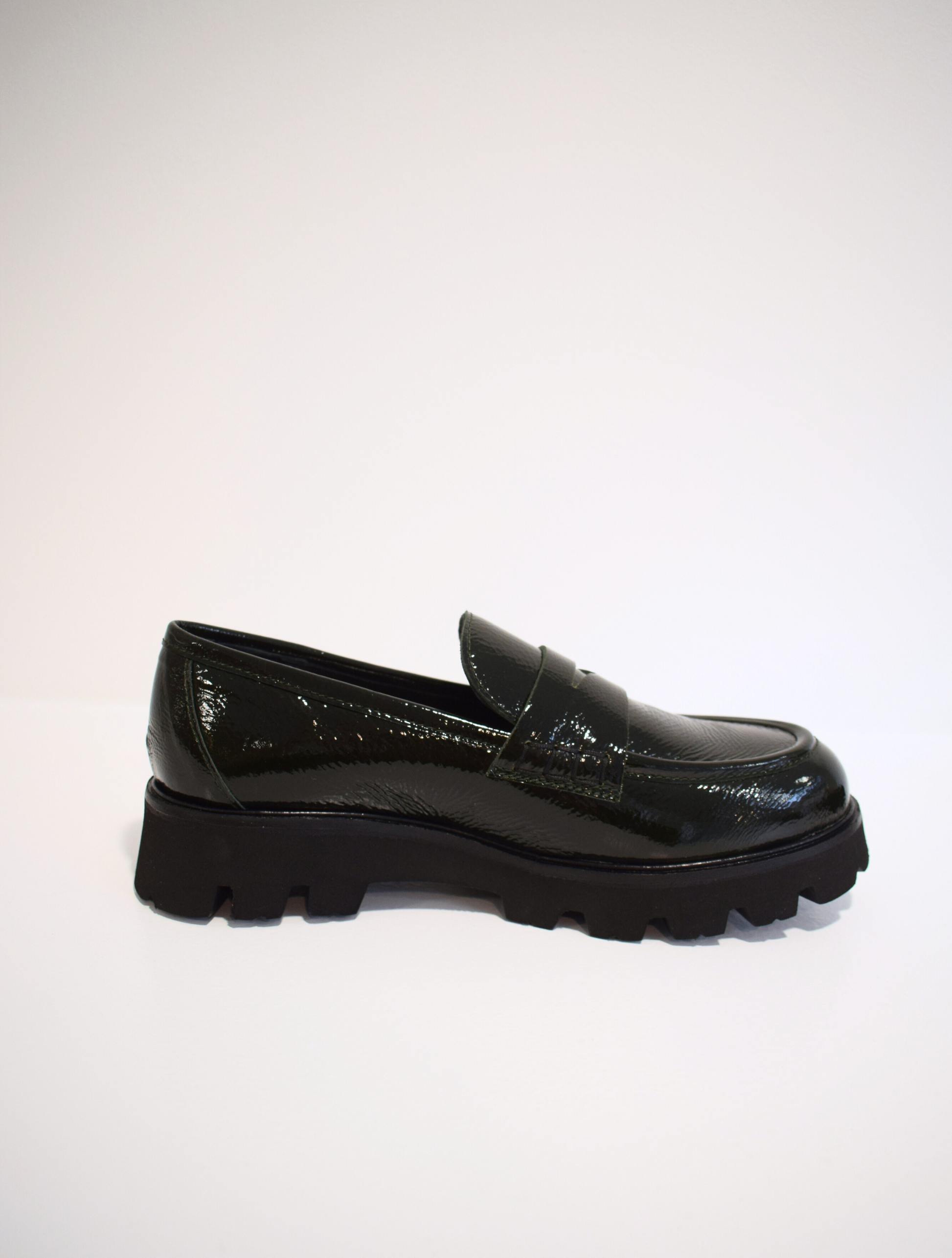 Patent moss green penny loafers with chunky black sole