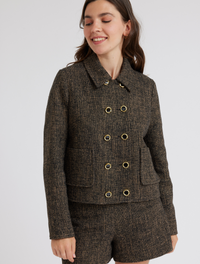 Cropped boucle and gold thread double breasted jacket with two patch pockets and gold and black enamel buttons