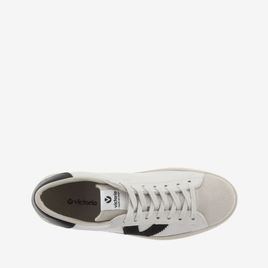 faux leather white trainers with suede toe and black v and back birds eye view