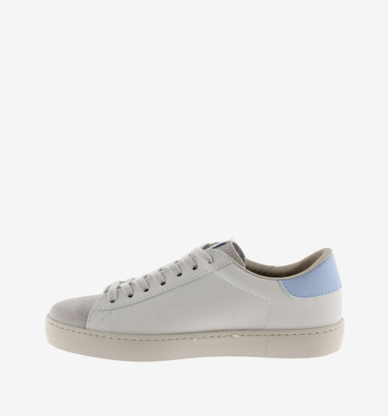 White leather pumps with suede toe flat rubber sole and contrast light blue "V" on the outer side and heel tab