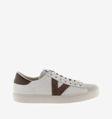 white faux leather trainers with suede top and chocolate brown v and back