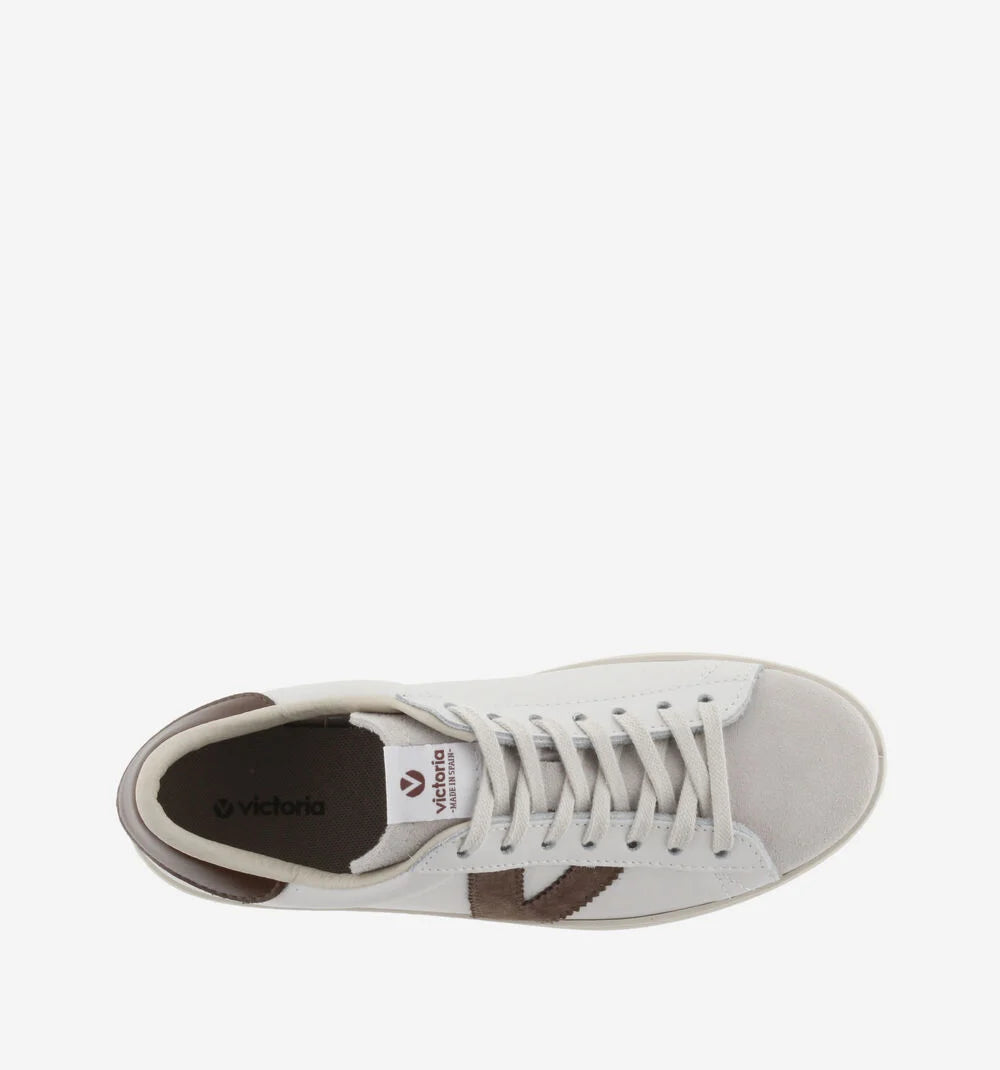 white faux leather trainers with suede top and chocolate brown v and back birds eye view