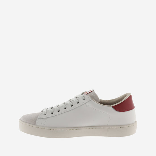 faux leather trainers with sueded toe and red V side view