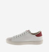 faux leather trainers with sueded toe and red V side view