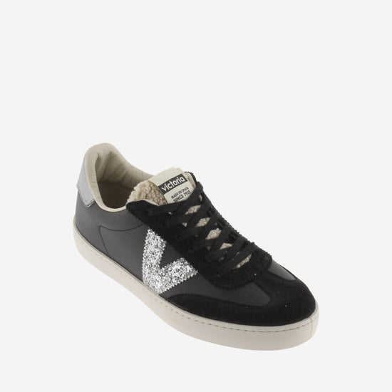 Black trainers with sparkly v and shearling 