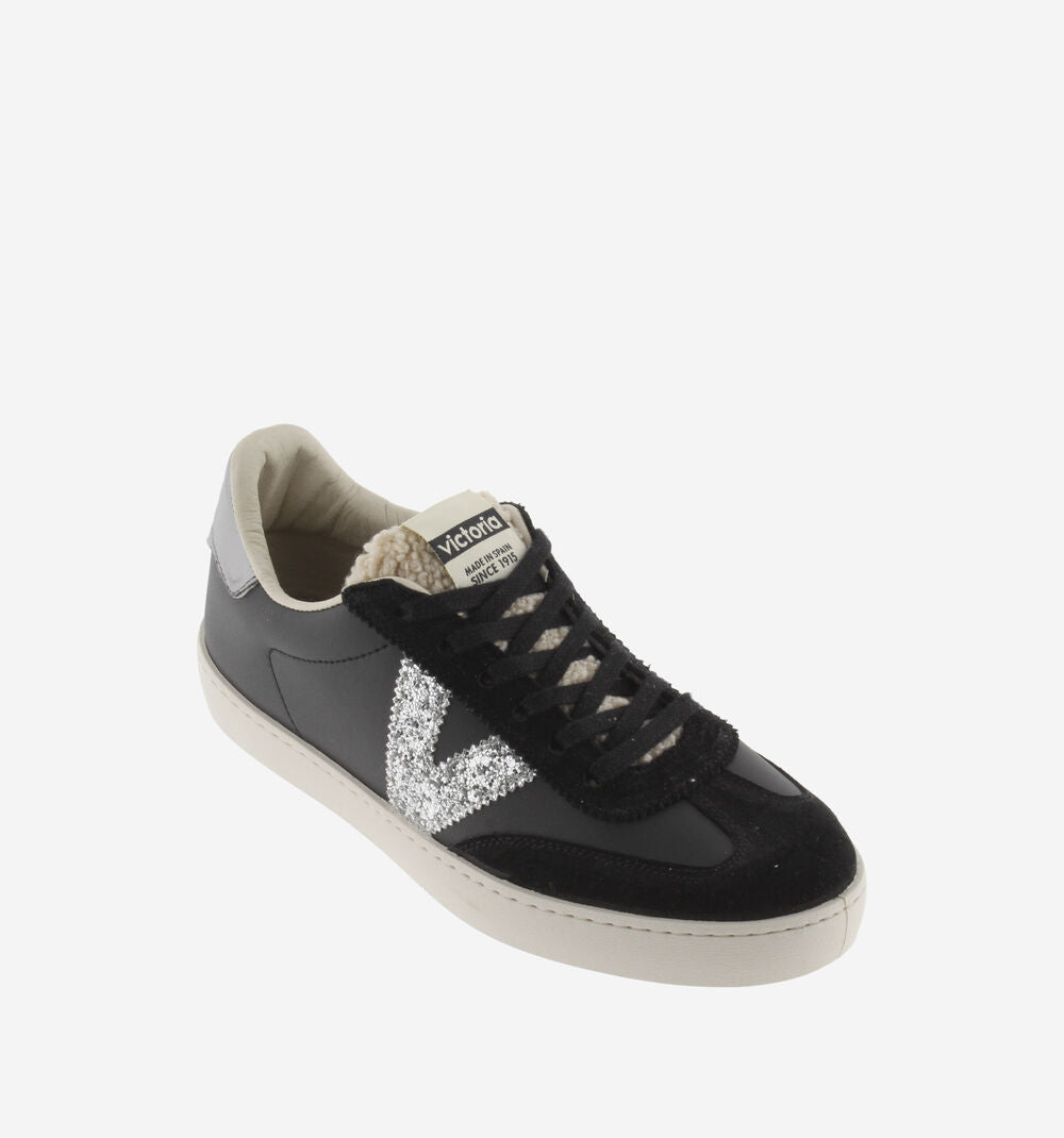 Black trainers with sparkly v and shearling 