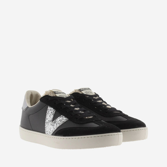 Black trainers with sparkly v and shearling 