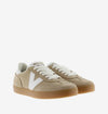 beige suede trainers with white v  front view