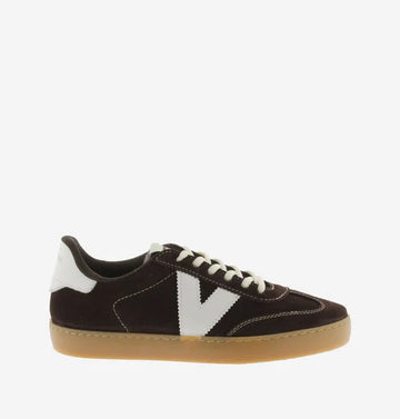 chocolate brown suede trainers with white back and v with off white laces 
