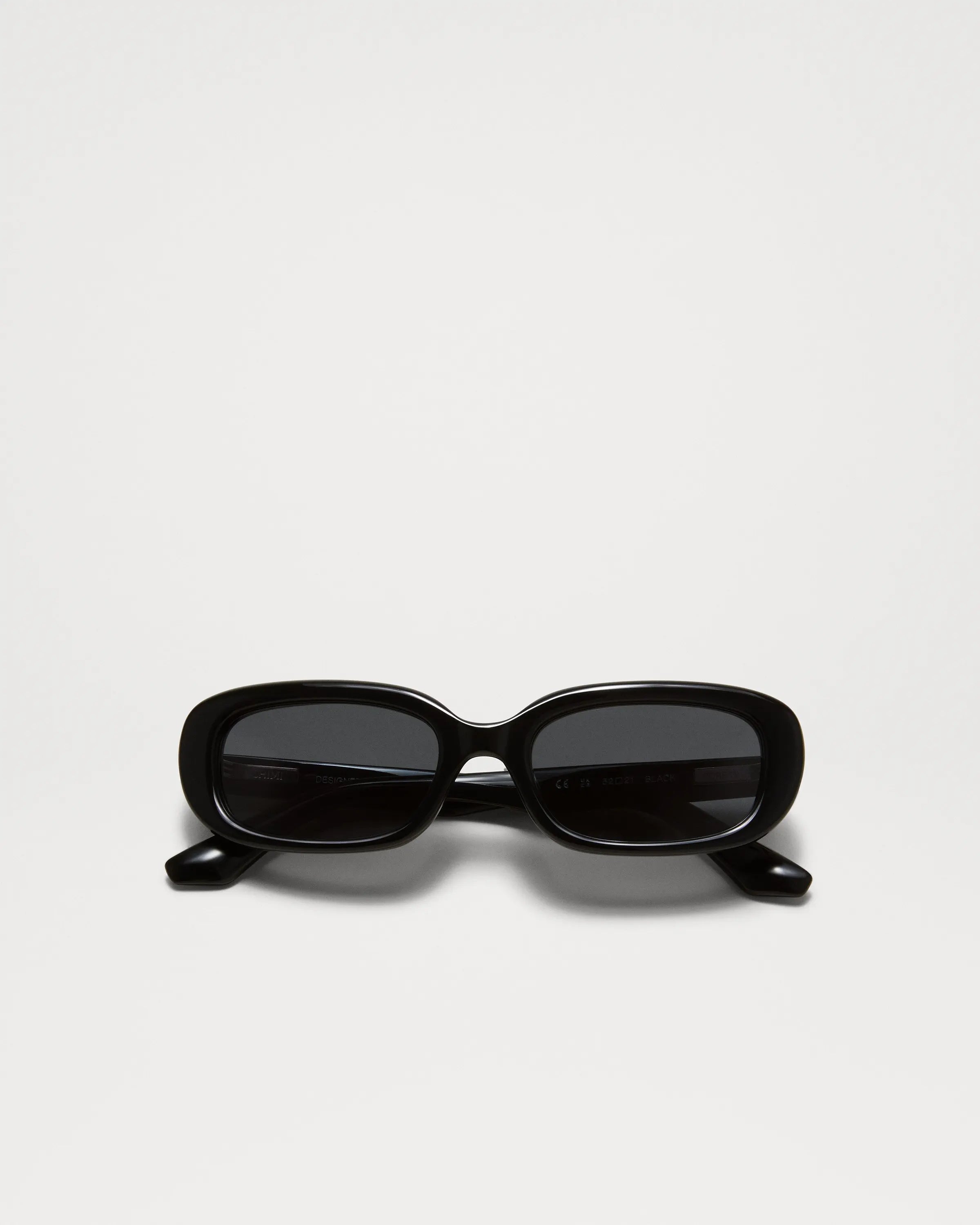Black rectangular framed sunglasses