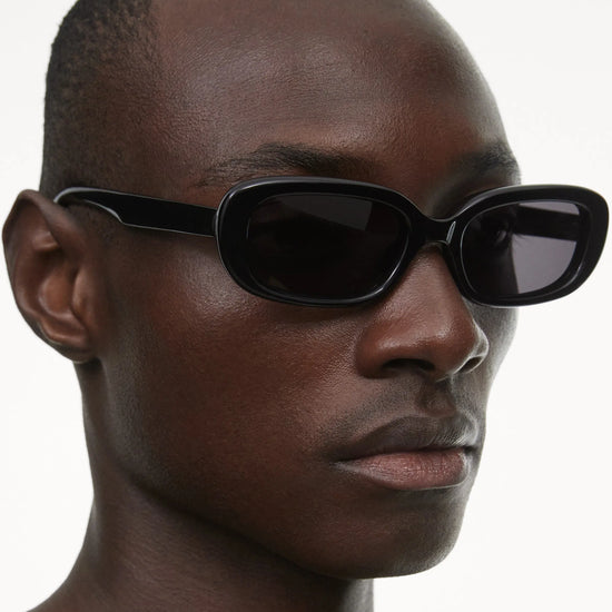 Black rectangular framed sunglasses