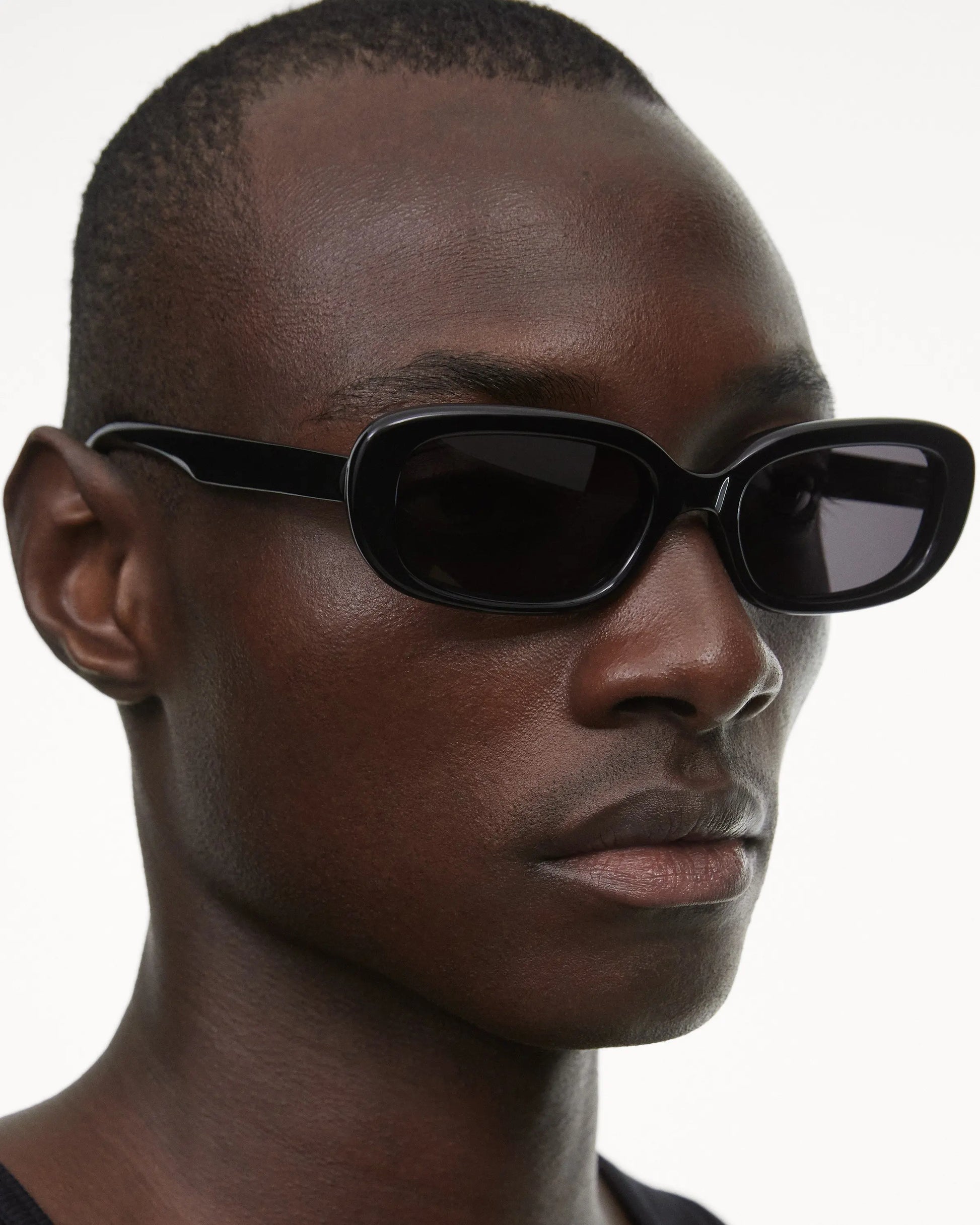 Black rectangular framed sunglasses