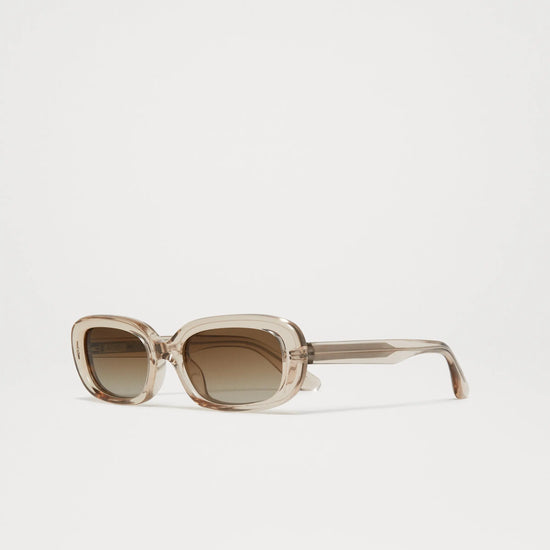 Ecru acetate soft edged rectangular sunglasses with a brown lense