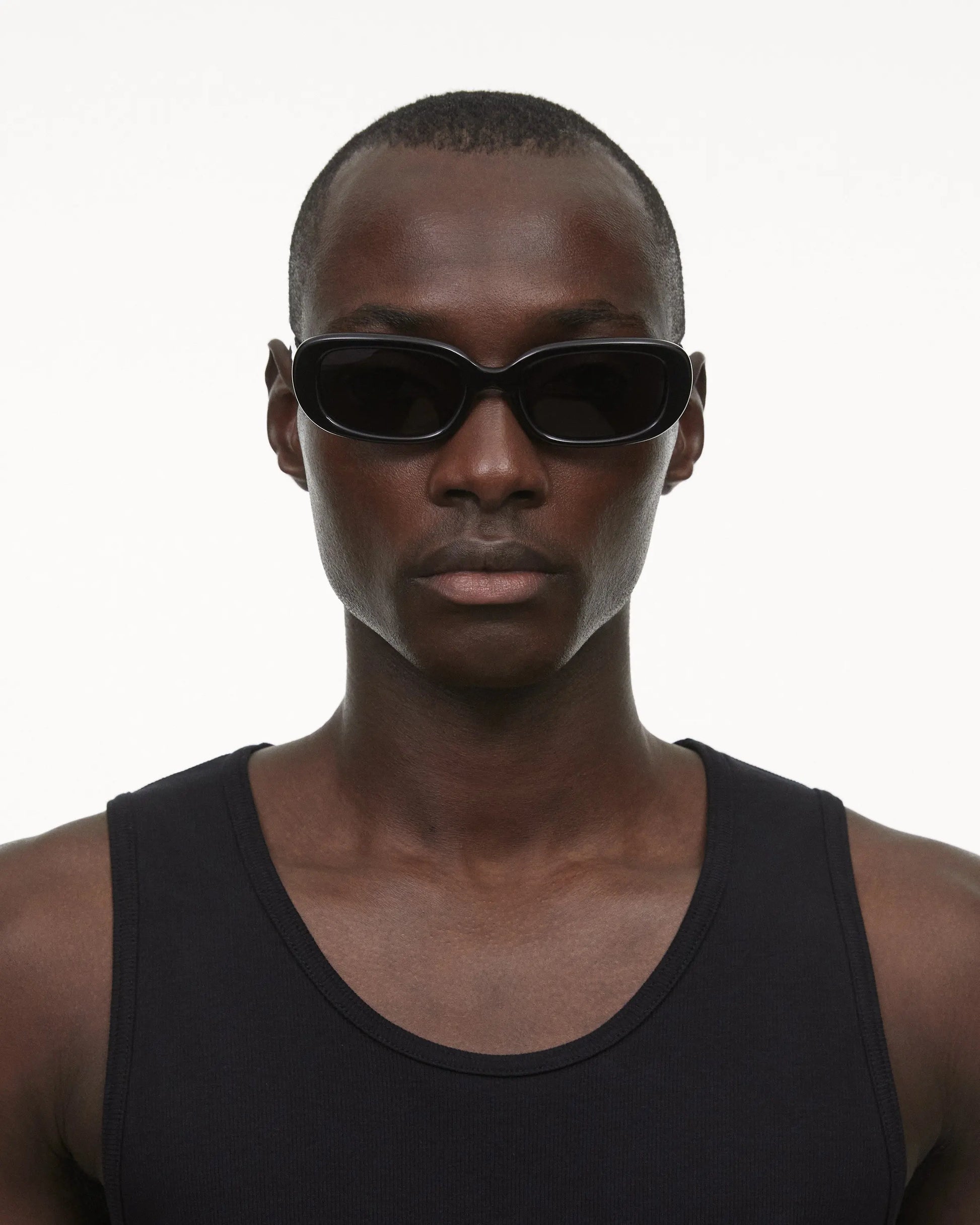 Black rectangular framed sunglasses