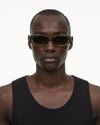 Green oval sunglasses with a green lense male model