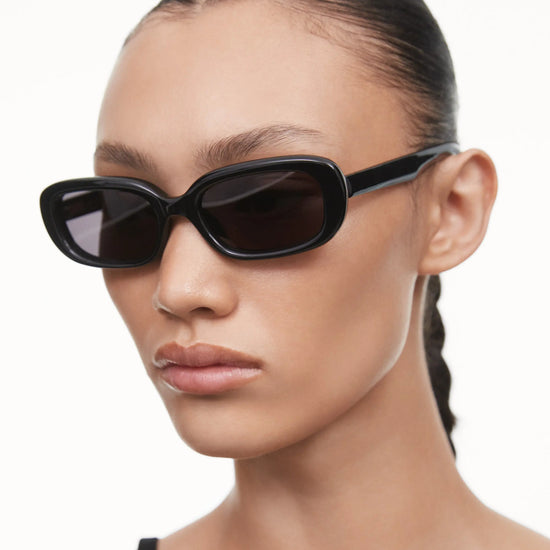 Black rectangular framed sunglasses