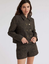 Cropped boucle and gold thread double breasted jacket with two patch pockets and gold and black enamel buttons