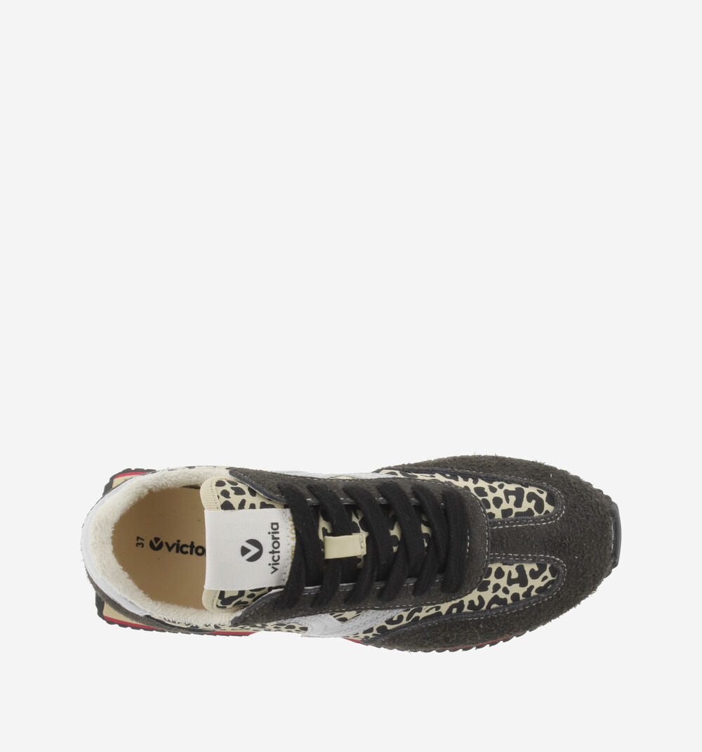 black trainers with silver v, animal print and black laces with fleece interior birds eye view